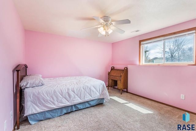6520 S Heatherridge Trl, Sioux Falls, SD 57108 - carpeted bedroom featuring ceiling fan and visible vents