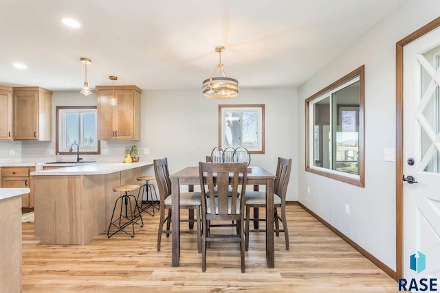 1000 N Six Mile Rd, Sioux Falls, SD 57110 - dining space with recessed lighting, light wood finished floors, and a healthy amount of sunlight