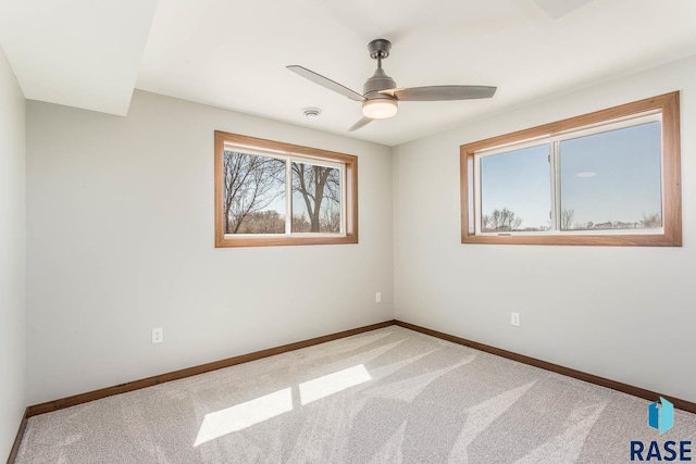 1000 N Six Mile Rd, Sioux Falls, SD 57110 - empty room with baseboards, a ceiling fan, and carpet floors