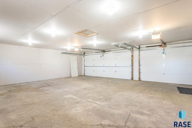 1000 N Six Mile Rd, Sioux Falls, SD 57110 - garage with a garage door opener