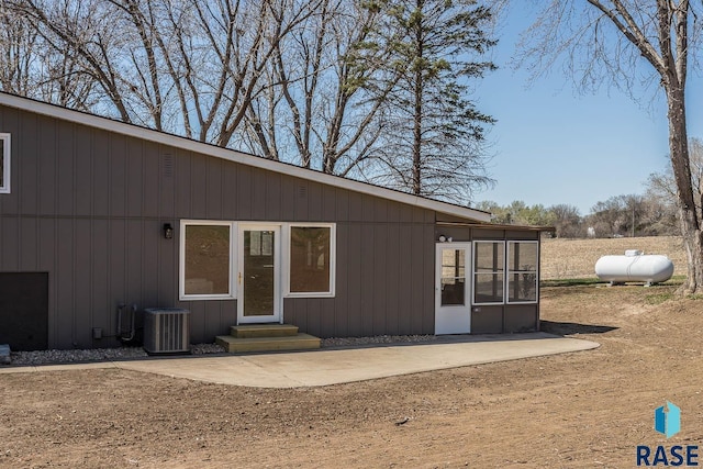1000 N Six Mile Rd, Sioux Falls, SD 57110 - exterior space with a patio, entry steps, and central AC