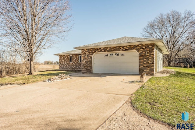 view of property exterior with concrete driveway, roof with shingles, brick siding, and an attached garage