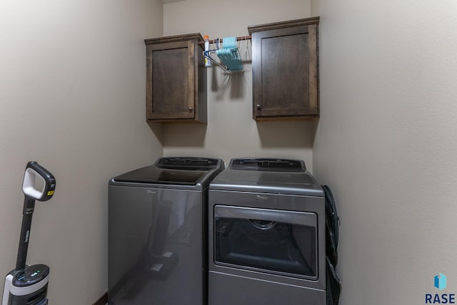 5320 S Solono Ave, Sioux Falls, SD 57108 - laundry area with washing machine and clothes dryer and cabinet space