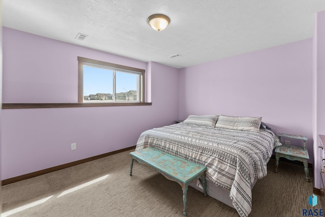 5320 S Solono Ave, Sioux Falls, SD 57108 - bedroom with carpet, visible vents, baseboards, and a textured ceiling