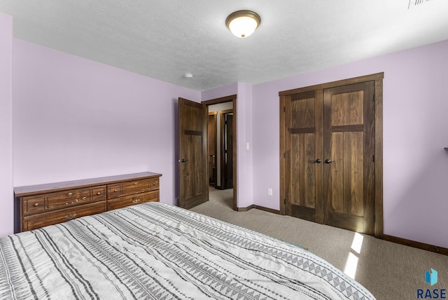 5320 S Solono Ave, Sioux Falls, SD 57108 - bedroom featuring a closet, carpet flooring, and baseboards