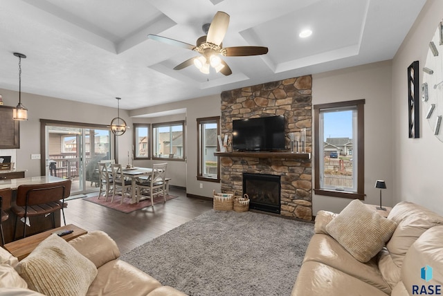 5320 S Solono Ave, Sioux Falls, SD 57108 - living room featuring plenty of natural light, a fireplace, ceiling fan, and wood finished floors