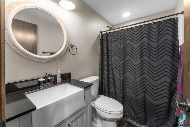 5320 S Solono Ave, Sioux Falls, SD 57108 - full bathroom with toilet, vanity, and a shower with shower curtain