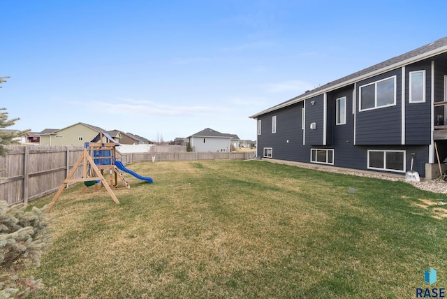 5320 S Solono Ave, Sioux Falls, SD 57108 - view of yard with a fenced backyard and a playground