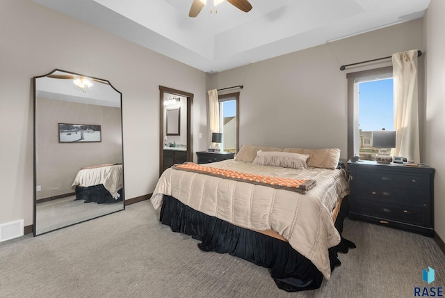 5320 S Solono Ave, Sioux Falls, SD 57108 - bedroom featuring baseboards, ensuite bath, carpet floors, visible vents, and ceiling fan