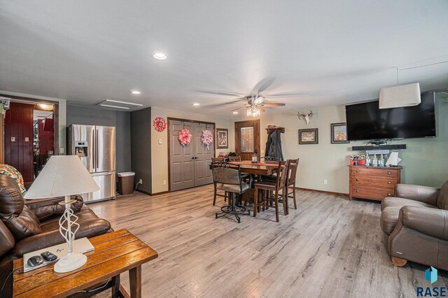dining room featuring light wood-style flooring, baseboards, recessed lighting, and ceiling fan