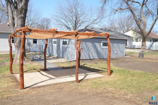 exterior space featuring fence and a carport