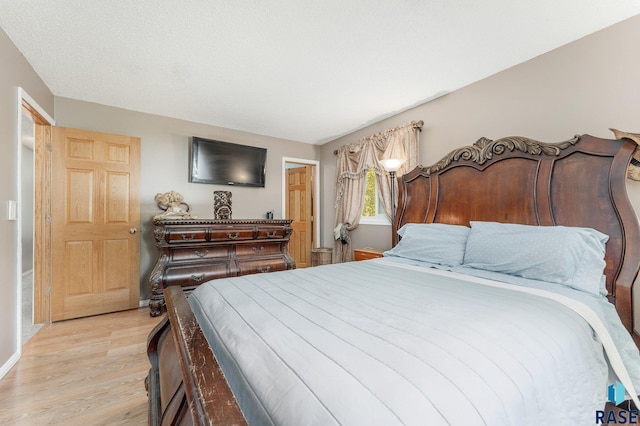 47205 94th St, Sioux Falls, SD 57108 - bedroom featuring light wood finished floors and baseboards
