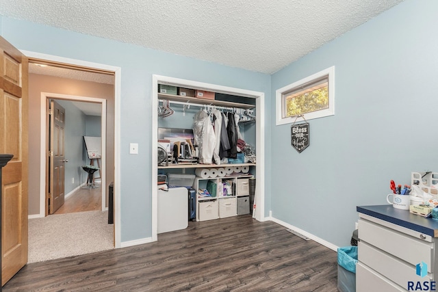 47205 94th St, Sioux Falls, SD 57108 - interior space with baseboards, dark wood-style floors, and a closet