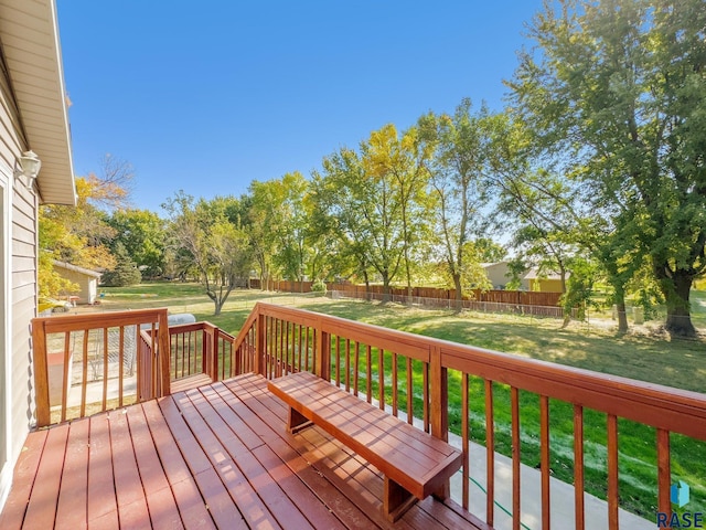 47205 94th St, Sioux Falls, SD 57108 - wooden deck featuring a fenced backyard and a yard