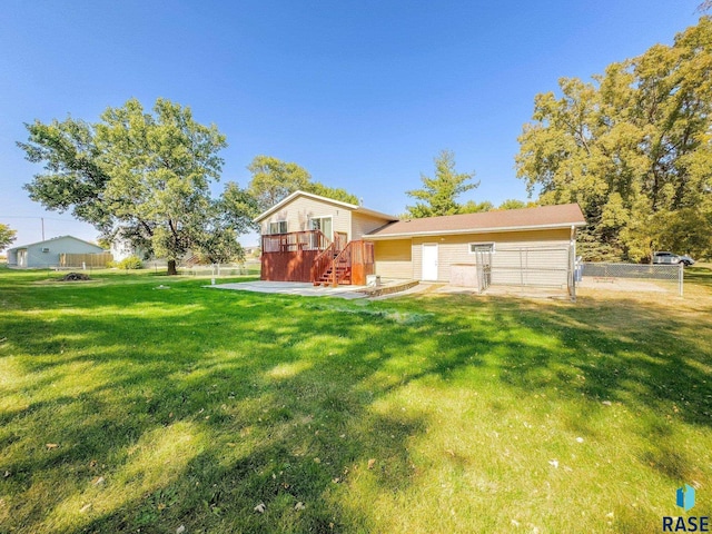 47205 94th St, Sioux Falls, SD 57108 - exterior space with fence, a gate, stairs, and a deck