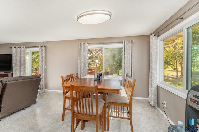 47205 94th St, Sioux Falls, SD 57108 - dining room featuring a wealth of natural light and baseboards