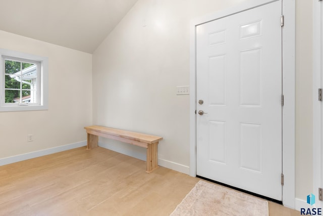 interior space with light wood-type flooring and baseboards