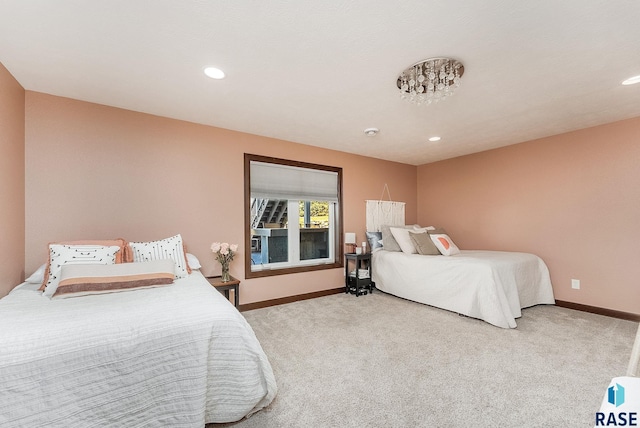 carpeted bedroom with baseboards and recessed lighting