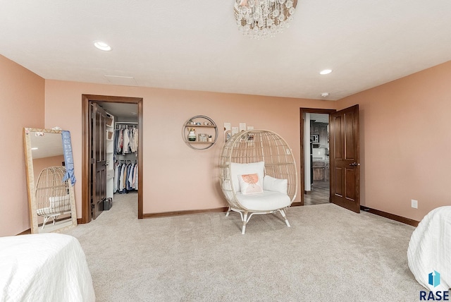 carpeted bedroom with baseboards, a spacious closet, recessed lighting, and a closet
