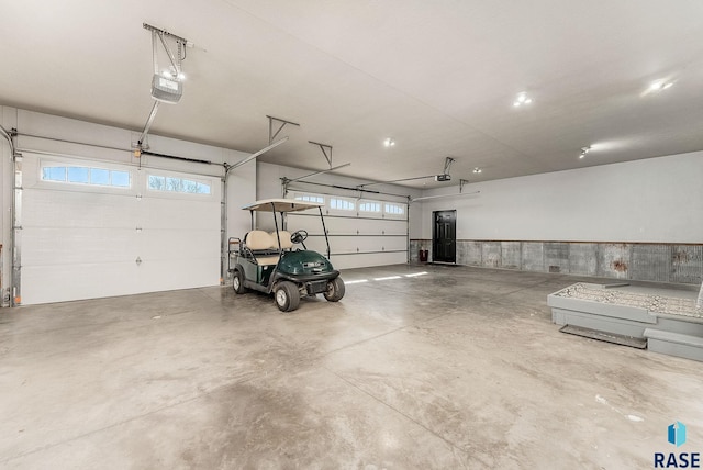 garage featuring a garage door opener