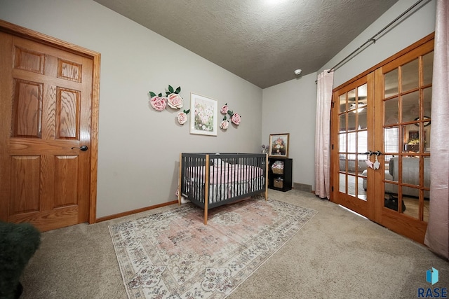 7304 W Lobelia St, Sioux Falls, SD 57106 - bedroom featuring carpet floors, a textured ceiling, baseboards, and french doors