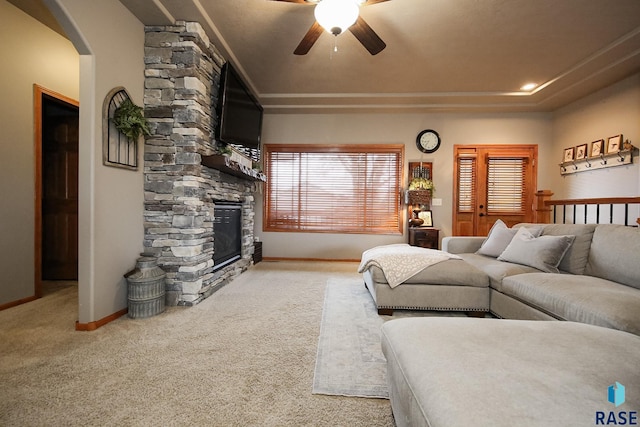 7304 W Lobelia St, Sioux Falls, SD 57106 - living area featuring ceiling fan, light colored carpet, baseboards, and a fireplace