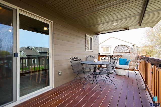 7304 W Lobelia St, Sioux Falls, SD 57106 - deck featuring outdoor dining area