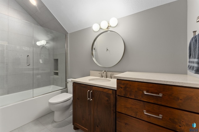 912 Torrey Pine Ln, Sioux Falls, SD 57110 - bathroom featuring vaulted ceiling, tile patterned floors, vanity, bath / shower combo with glass door, and toilet
