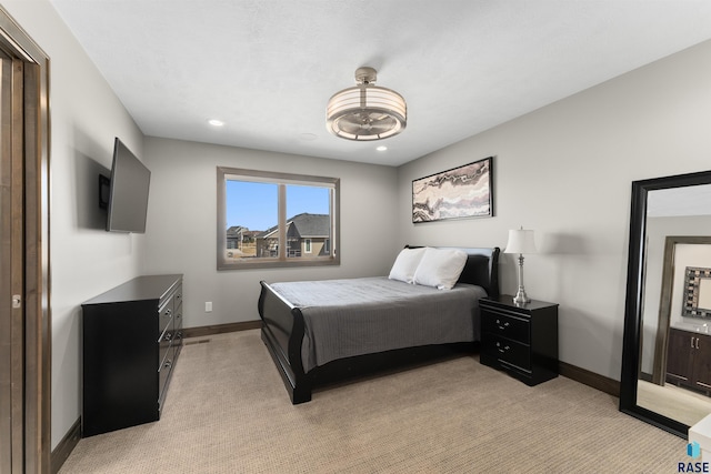 912 Torrey Pine Ln, Sioux Falls, SD 57110 - bedroom with light carpet, baseboards, and recessed lighting