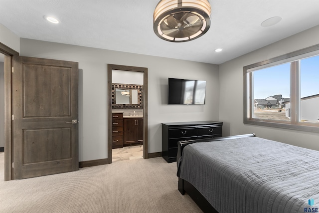 912 Torrey Pine Ln, Sioux Falls, SD 57110 - bedroom featuring recessed lighting, baseboards, light carpet, and ensuite bathroom