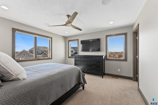 912 Torrey Pine Ln, Sioux Falls, SD 57110 - bedroom featuring a ceiling fan, light colored carpet, baseboards, visible vents, and recessed lighting