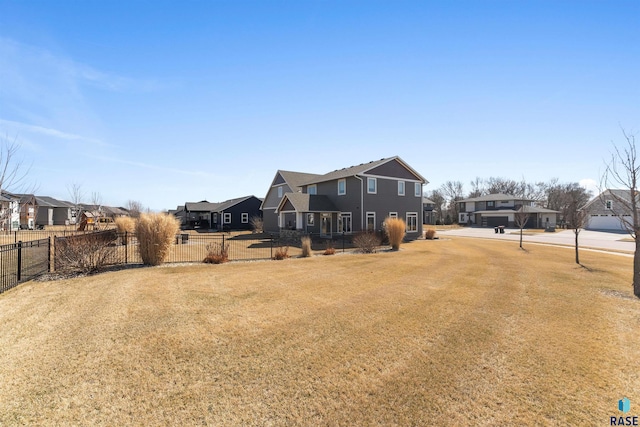 912 Torrey Pine Ln, Sioux Falls, SD 57110 - exterior space featuring a yard, fence, and a residential view