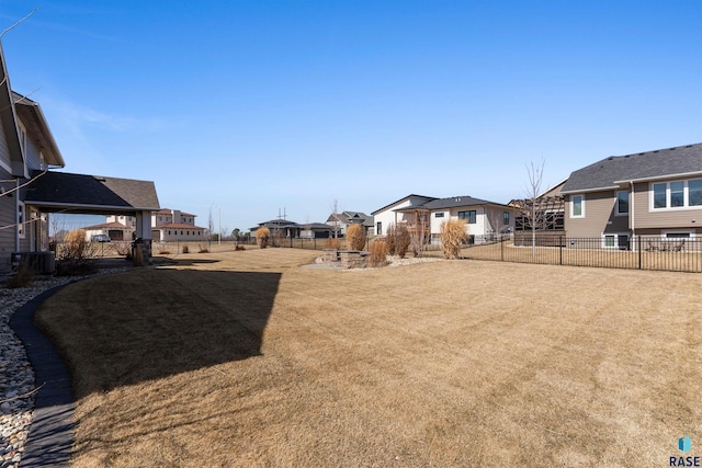 912 Torrey Pine Ln, Sioux Falls, SD 57110 - view of yard with a residential view and fence