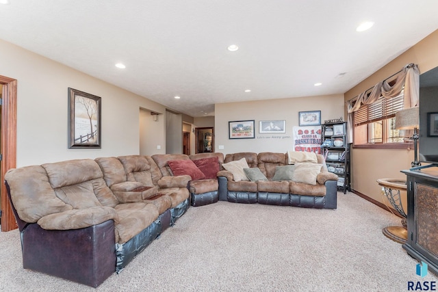 carpeted living room with baseboards and recessed lighting