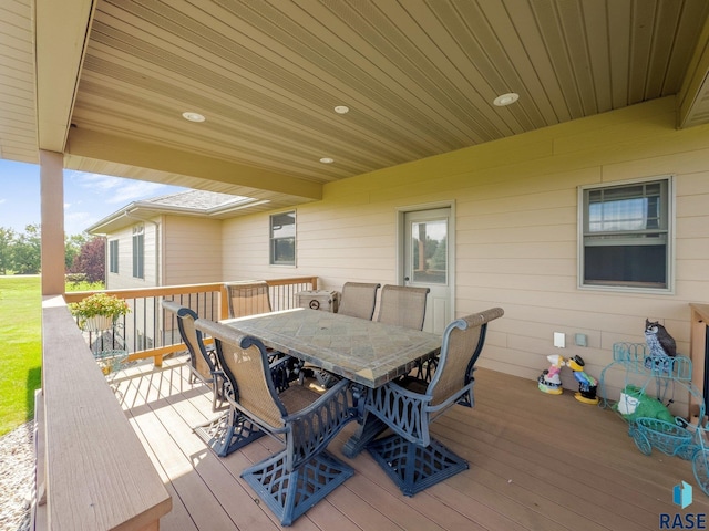 deck featuring outdoor dining space