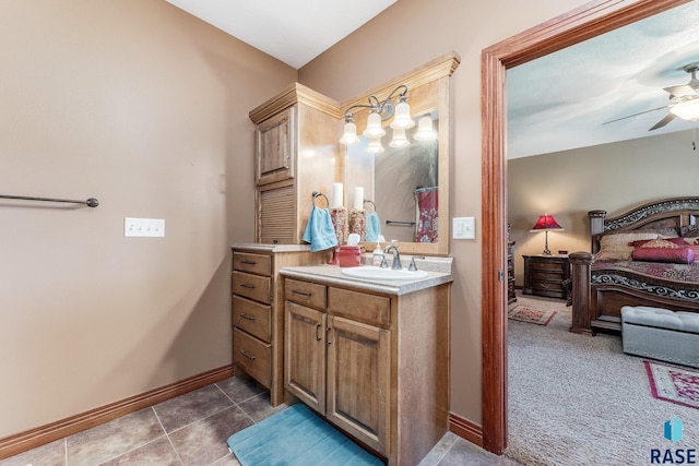 full bath featuring baseboards, a ceiling fan, vanity, and tile patterned floors