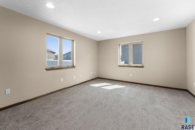 3508 E Prairie Wind St, Sioux Falls, SD 57108 - empty room featuring recessed lighting, carpet floors, and baseboards