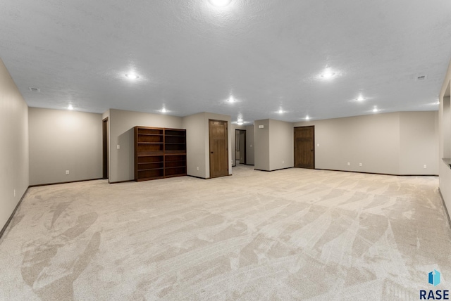 3508 E Prairie Wind St, Sioux Falls, SD 57108 - finished basement featuring light carpet, baseboards, and recessed lighting