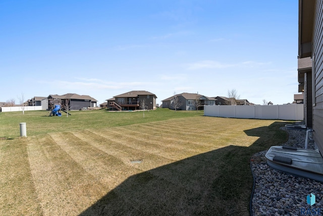 3508 E Prairie Wind St, Sioux Falls, SD 57108 - view of yard featuring a residential view and fence