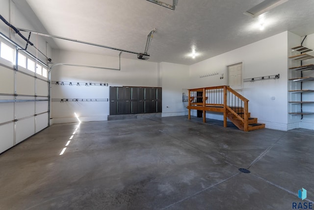 3508 E Prairie Wind St, Sioux Falls, SD 57108 - garage with a garage door opener and baseboards