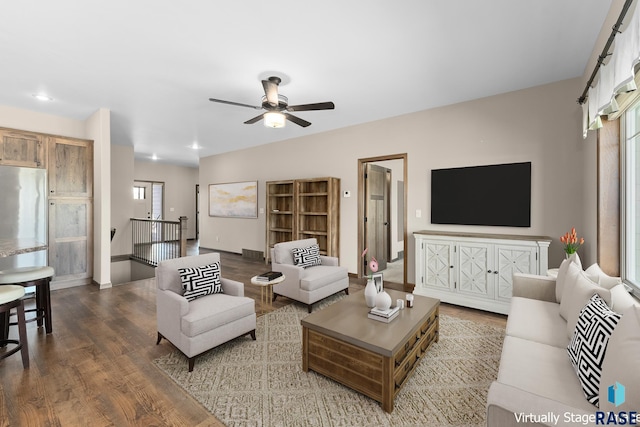 3508 E Prairie Wind St, Sioux Falls, SD 57108 - living area featuring wood finished floors, baseboards, and ceiling fan