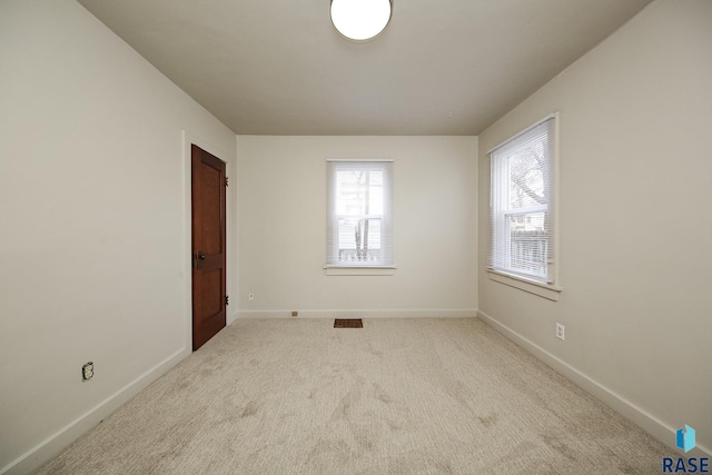 1330 W 14th St, Sioux Falls, SD 57104 - empty room with carpet and baseboards