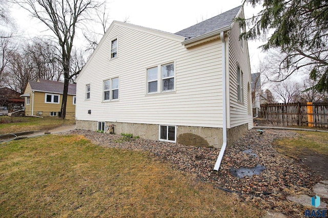 1330 W 14th St, Sioux Falls, SD 57104 - view of side of home featuring fence and a yard