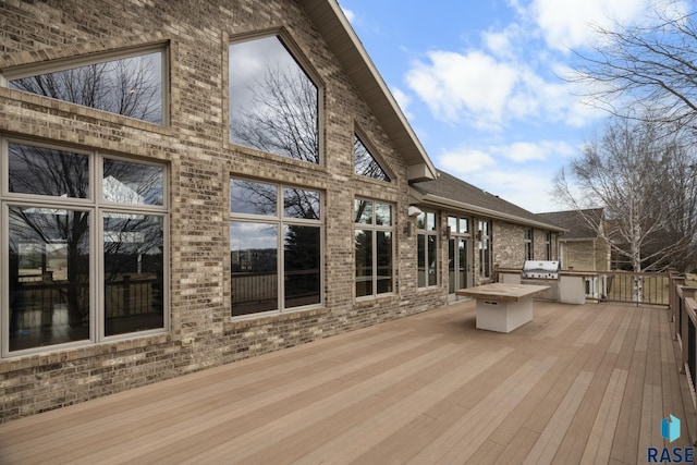 6301 S Grand Prairie Dr, Sioux Falls, SD 57108 - wooden deck featuring grilling area and exterior kitchen