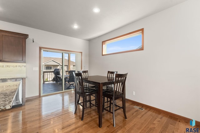 5508 S Sirocco Ave, Sioux Falls, SD 57108 - dining room featuring baseboards, light wood-style floors, visible vents, and recessed lighting