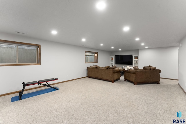 5508 S Sirocco Ave, Sioux Falls, SD 57108 - carpeted living area featuring baseboards, visible vents, and recessed lighting