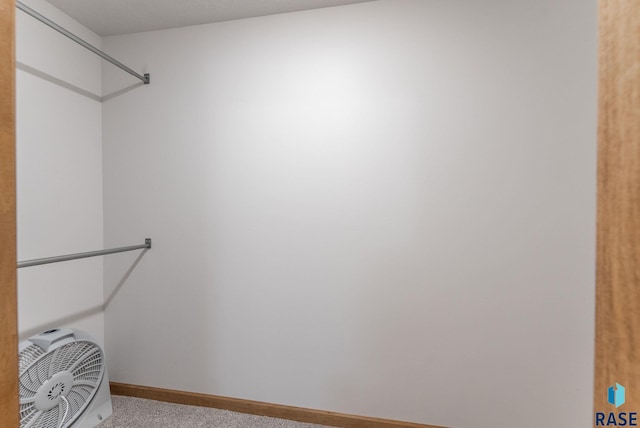 5508 S Sirocco Ave, Sioux Falls, SD 57108 - walk in closet featuring light carpet