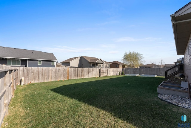 5508 S Sirocco Ave, Sioux Falls, SD 57108 - view of yard featuring a fenced backyard and a residential view