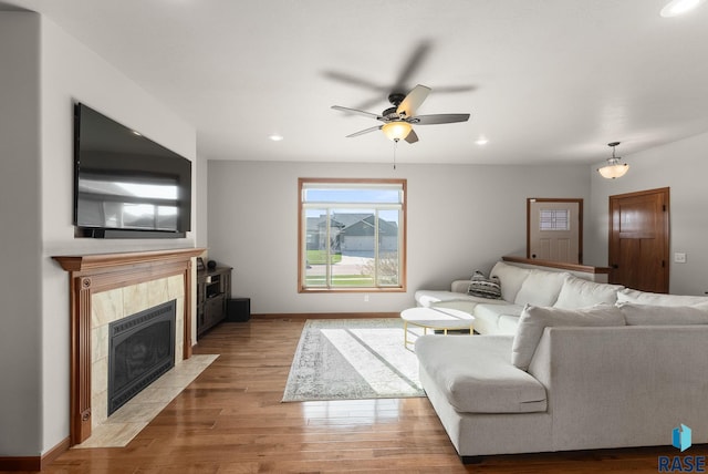 5508 S Sirocco Ave, Sioux Falls, SD 57108 - living area with recessed lighting, wood finished floors, baseboards, and ceiling fan