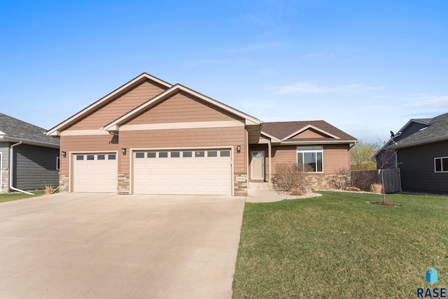 5508 S Sirocco Ave, Sioux Falls, SD 57108 - craftsman house featuring stone siding, driveway, a front yard, and a garage